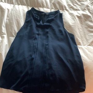 Navy dress blouse with pleating.